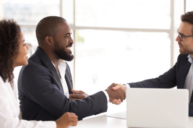 Two men shaking hands